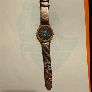 Brown analogue watch with wooden face and leather band #analoguewatch